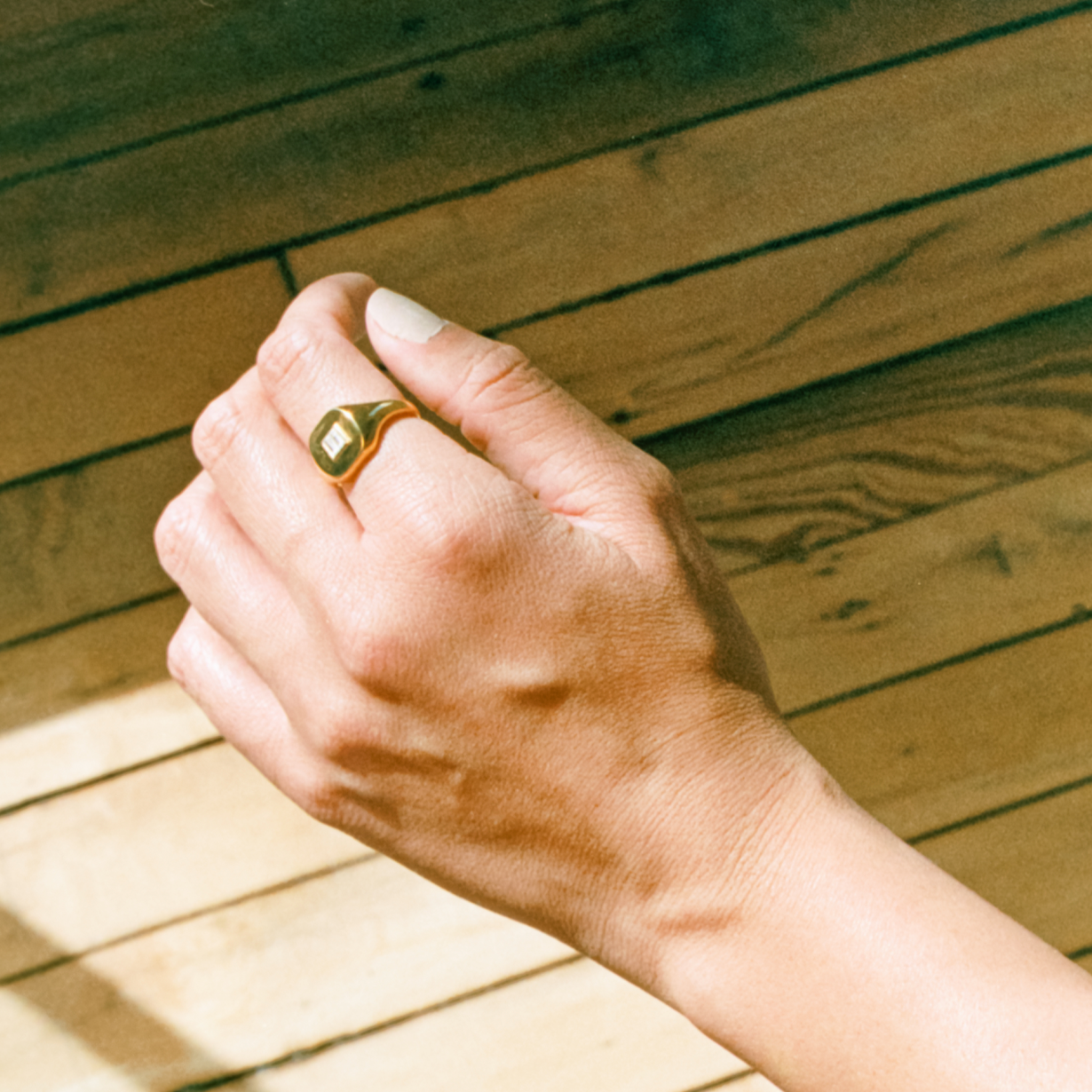 The special, chunky signet ring that you've been looking for all along. The Billy Signet Ring is a perfect in-between of a masculine and feminine look with a bold and exaggerated face. Subtly embellished with two baguette zircon stones.
